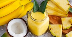 Homemade Pineapple, Banana and Coconut Smoothie in a Mason Jar