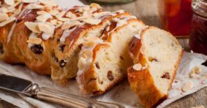 Homemade Sweet Sliced Braided Bread with Flaked Almonds and Raisins