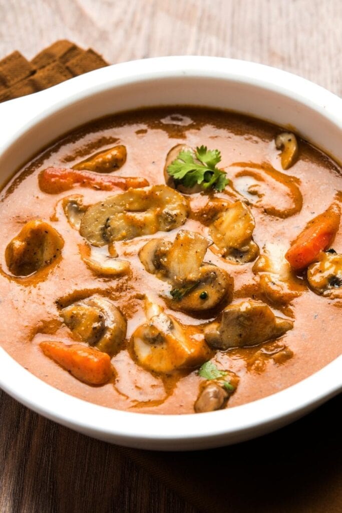 Indian Mushroom Masala with Carrots in a Bowl