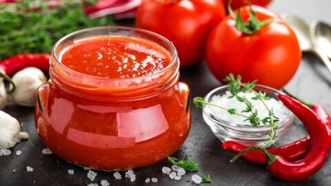 Jar of Tomato Puree with Chili Pepper, Onions and Fresh Tomatoes