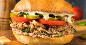 Mexican Pork Torta Sandwich with Tomatoes and Jalapenos