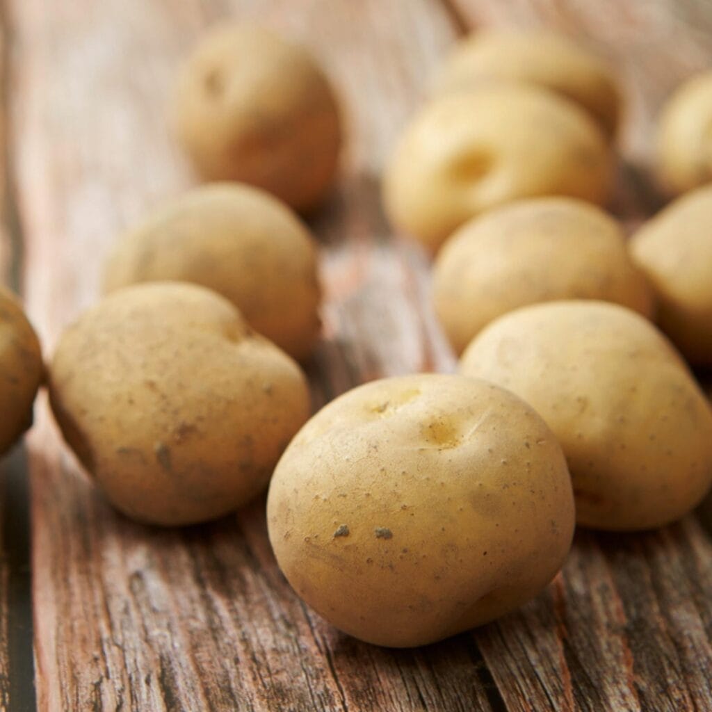 Potatoes on Top of a Wooden Table