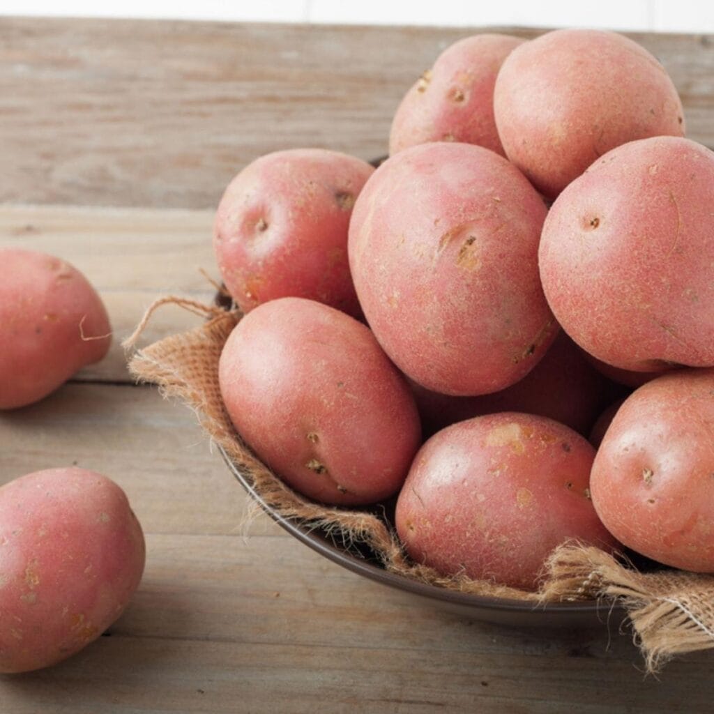 Red Potatoes on a Big Wooden Bowl 