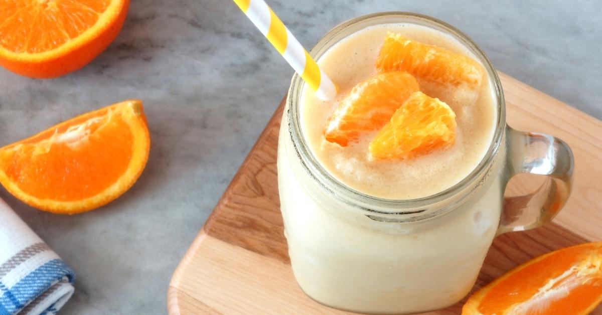 Refreshing Drink Orange Smoothie in a Mason Jar