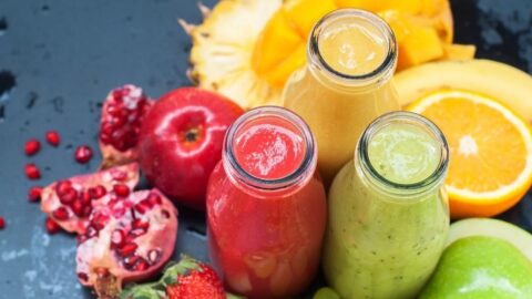 Refreshing Fruit Smoothies with Apple, Orange, Strawberries and Pomegranate