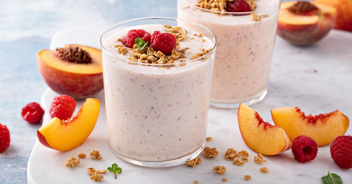 Refreshing Homemade Raspberry and Peach Smoothie with Granola