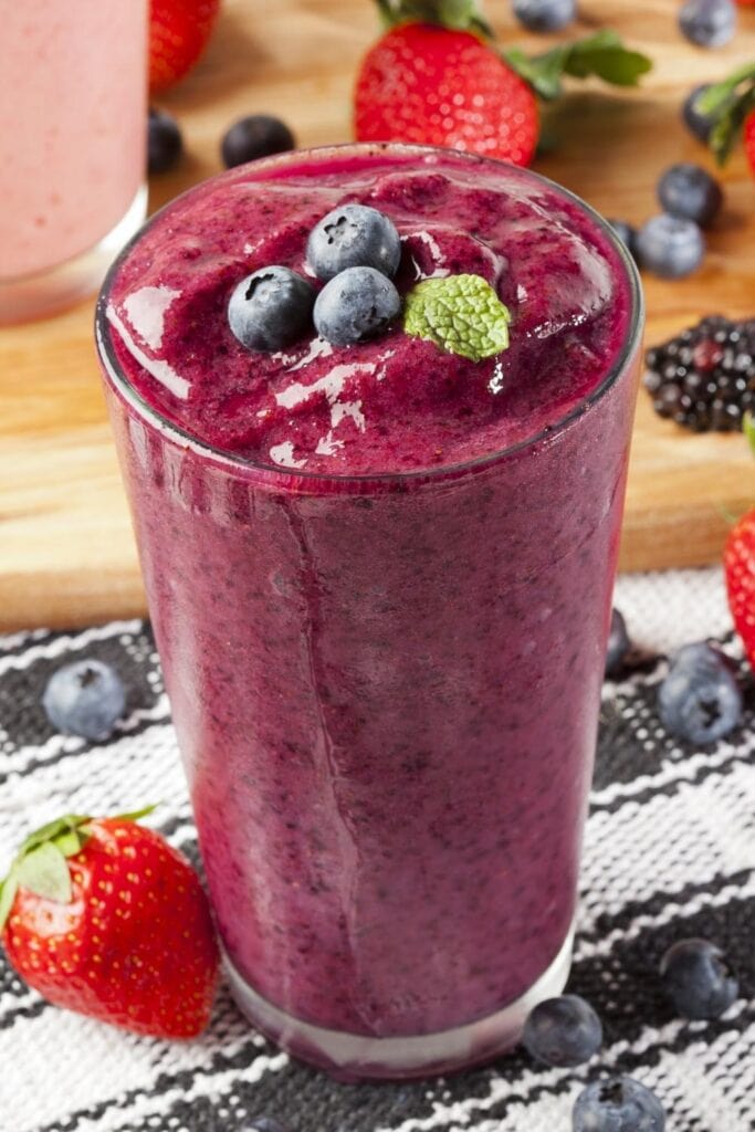 Refreshing strawberry and blueberry smoothie in a glass