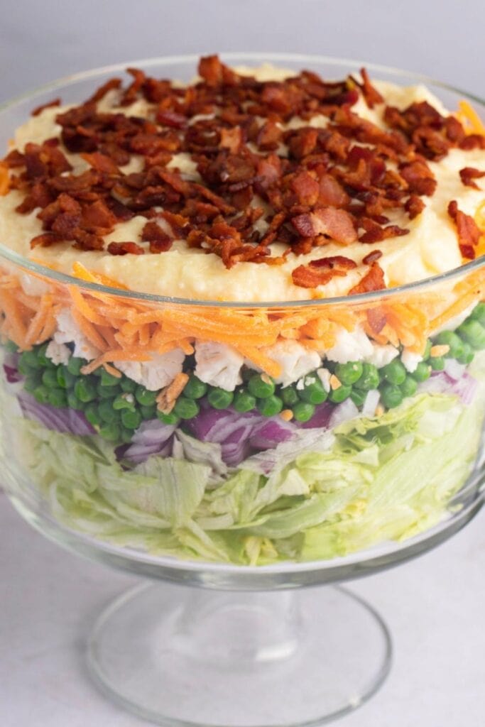 Seven-Layer Salad in a Glass Bowl