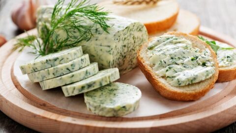 Slices of Homemade Herb Butter with Bread