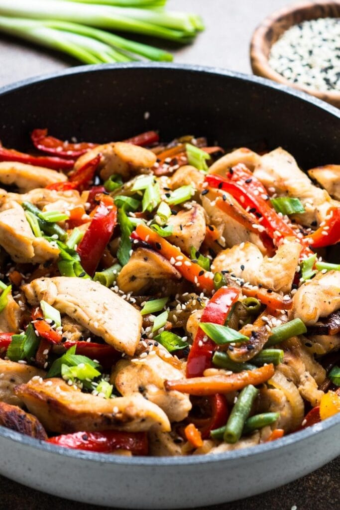 Stir-Fry Quorn Chicken Pieces with Vegetables and Sesame Seeds