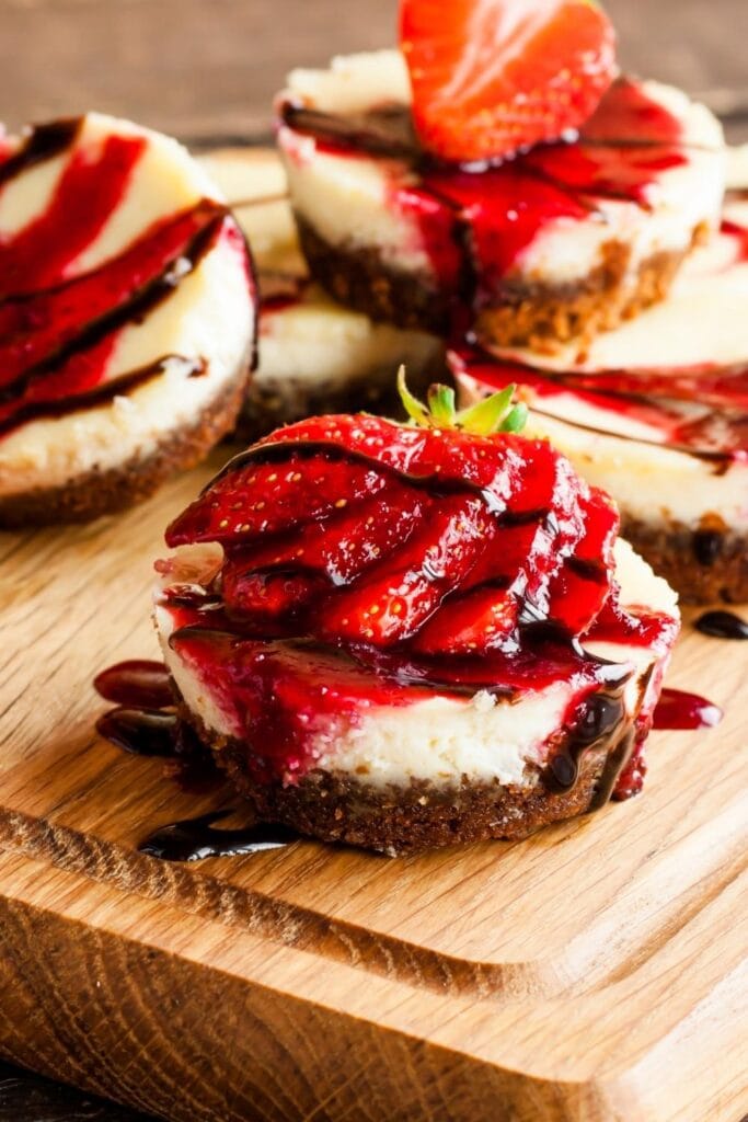 Sweet Chocolate Cheesecake with Strawberries and Chocolate Sauce