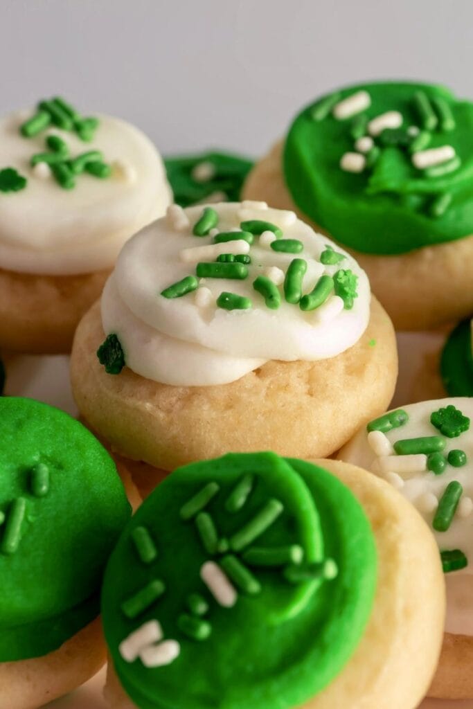 Sweet sugar cookies with white and green icing for St. Patrick's Day