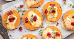 Appetizing Homemade Baked Sweet Potato Rounds with Cheese, Walnuts and Cranberries
