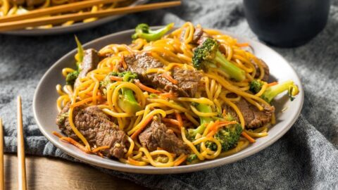 Beef Lo Mein with Beef and Broccoli in a White Plate