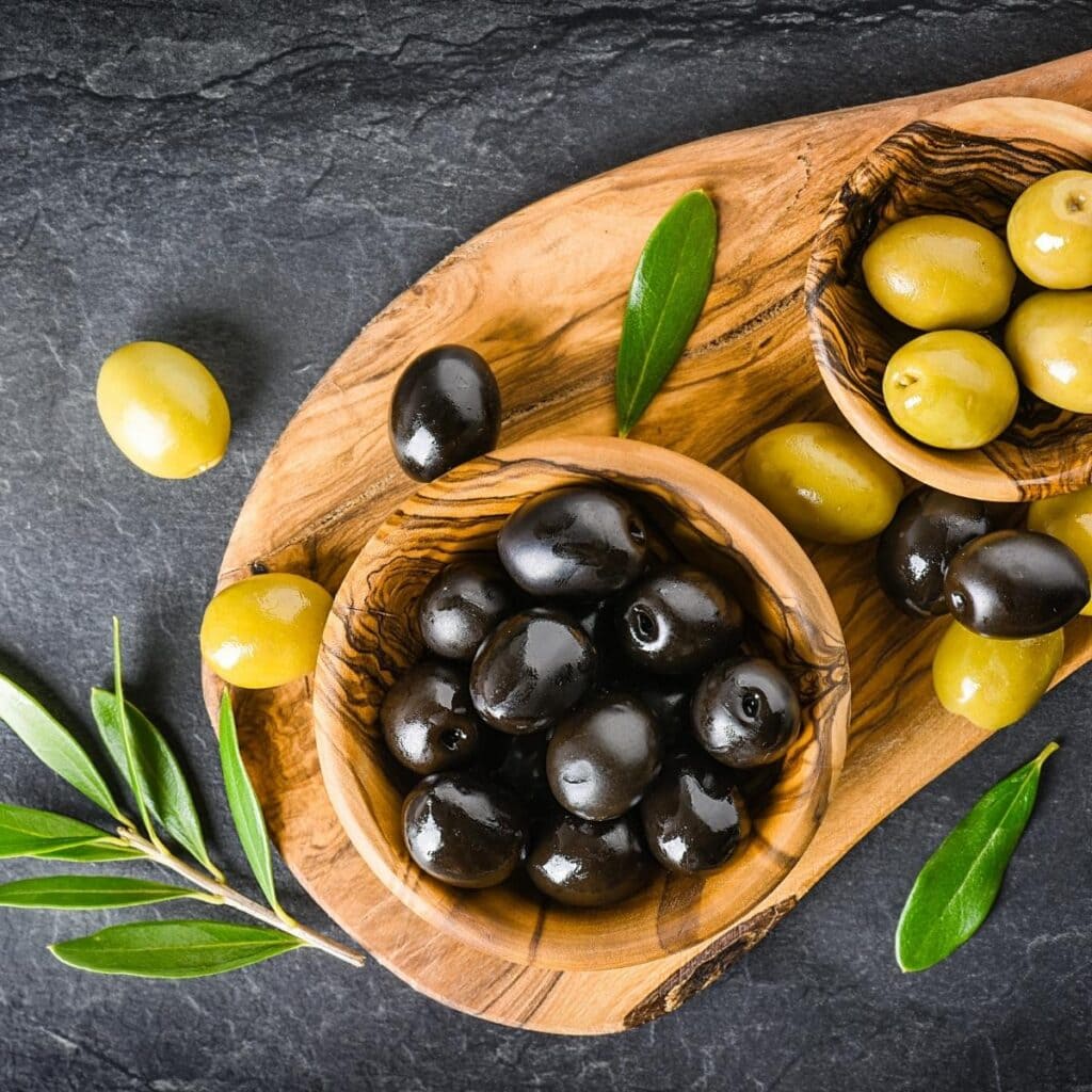 Black Olives in a Wooden Bowl