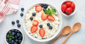 Bowl of Cottage Cheese with Strawberries and Blueberries