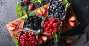 Bowl of Fresh Berries: Red Currant, Blackberries, Raspberries and Blueberries