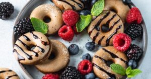 Cinnamon and Chocolate Mini Donuts with Fresh Berries