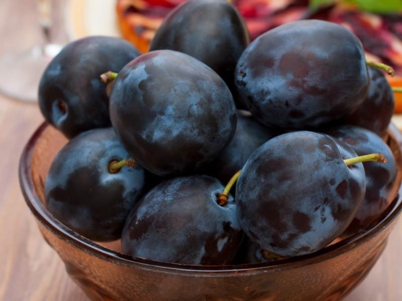 French Prunes on a Brown Glass Bowl
