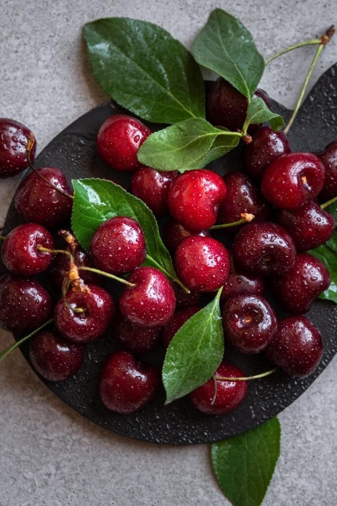 Fresh Ripe Cherry Fruit with Leaves