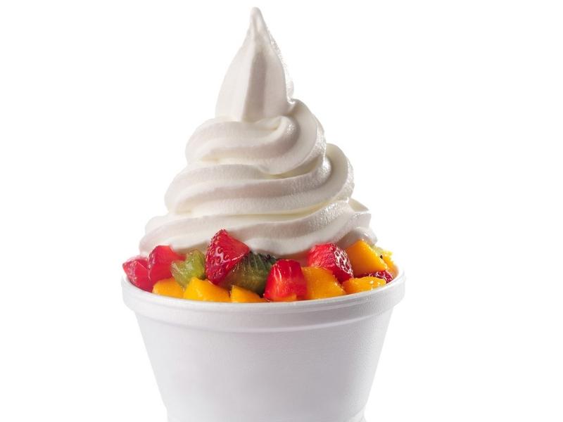 Sliced Fresh Fruits Topped With Frozen Yogurt