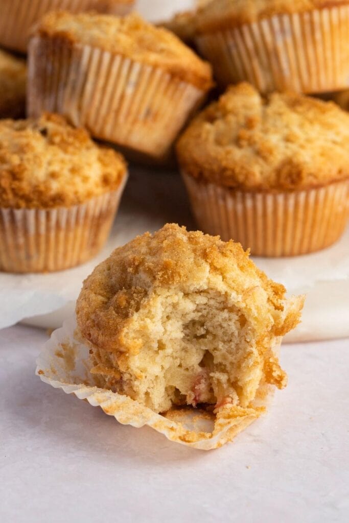Half-bitten Newly Baked Apple Strudel Muffins