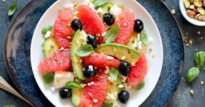 Healthy Homemade Avocado Grapefruit Salad with Black Olives and Cheese