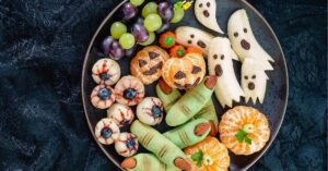 Healthy Spooky Halloween Fruit Treats with Bananas and Oranges
