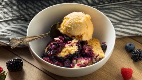 Homemade Berry Cobbler with Ice Cream In A Bowl