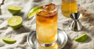Homemade Boozy Dark and Stormy Cocktail with Lime