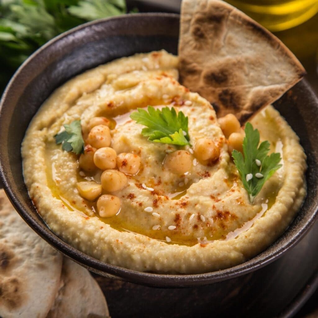 Homemade Chickpea Hummus with Olive Oil and Pita Bread