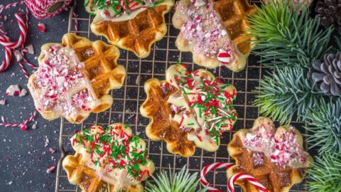 Homemade Christmas Waffles with Peppermint Candies in a Baking Rack