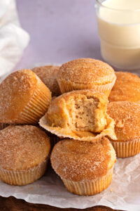 Homemade Cinnamon Muffins Stacked Served with Milk
