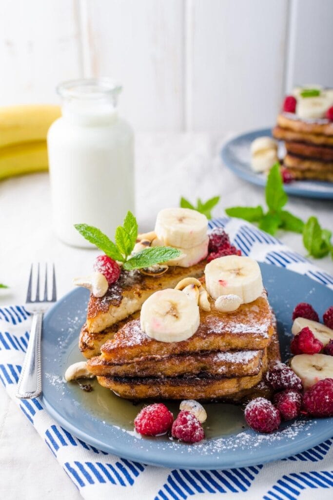 Homemade French Toast with Raspberries and Banana Slices