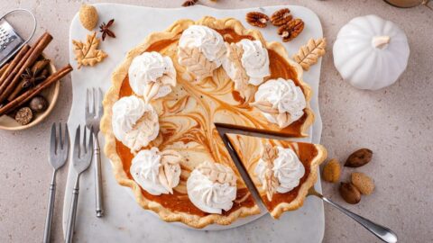 Homemade No-Bake Pumpkin Cheesecake with Cinnamon and Whipped Cream