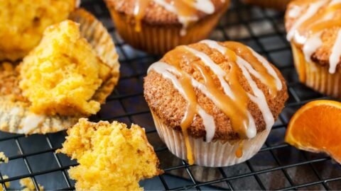 Homemade Orange and Carrot Muffins in a Baking Rack