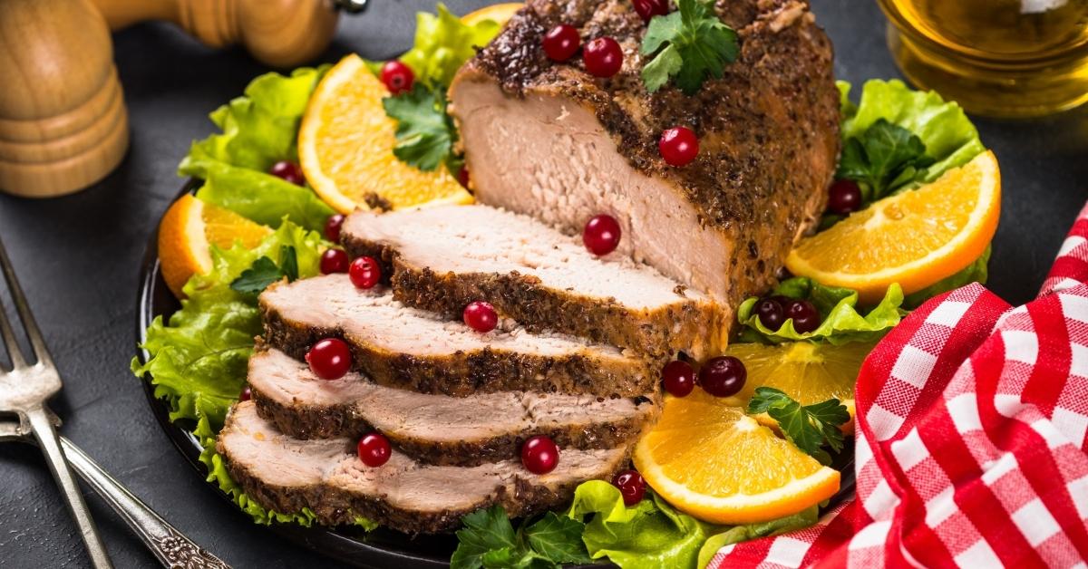 https://insanelygoodrecipes.com/wp-content/uploads/2022/10/Homemade-Savory-Christmas-Ham-with-Cranberry-and-Oranges.jpg