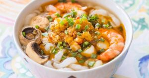 Homemade Scallop and Prawn Soup with Noodles and Green Onions