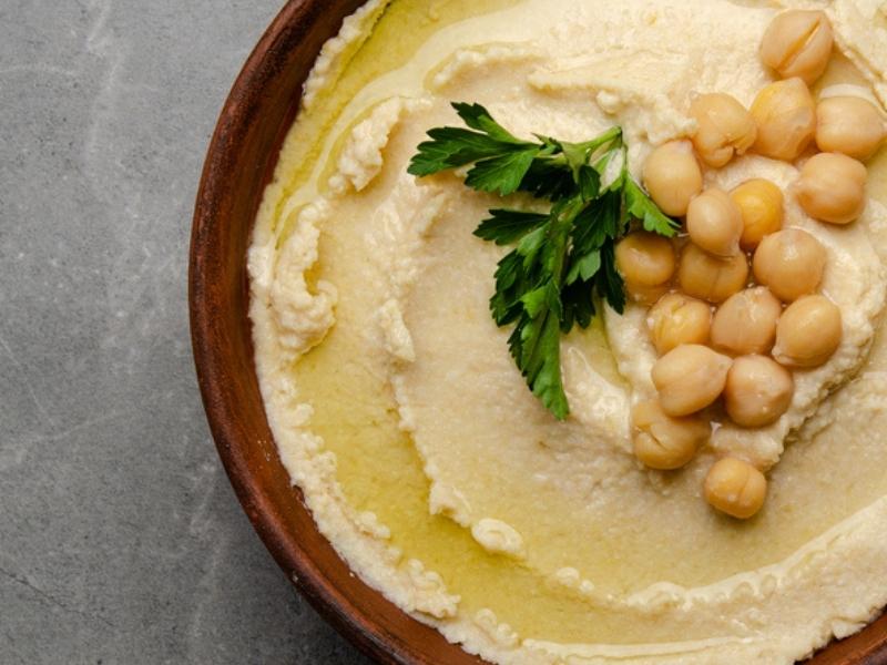 Hummus Topped With Chickpeas and Parsley