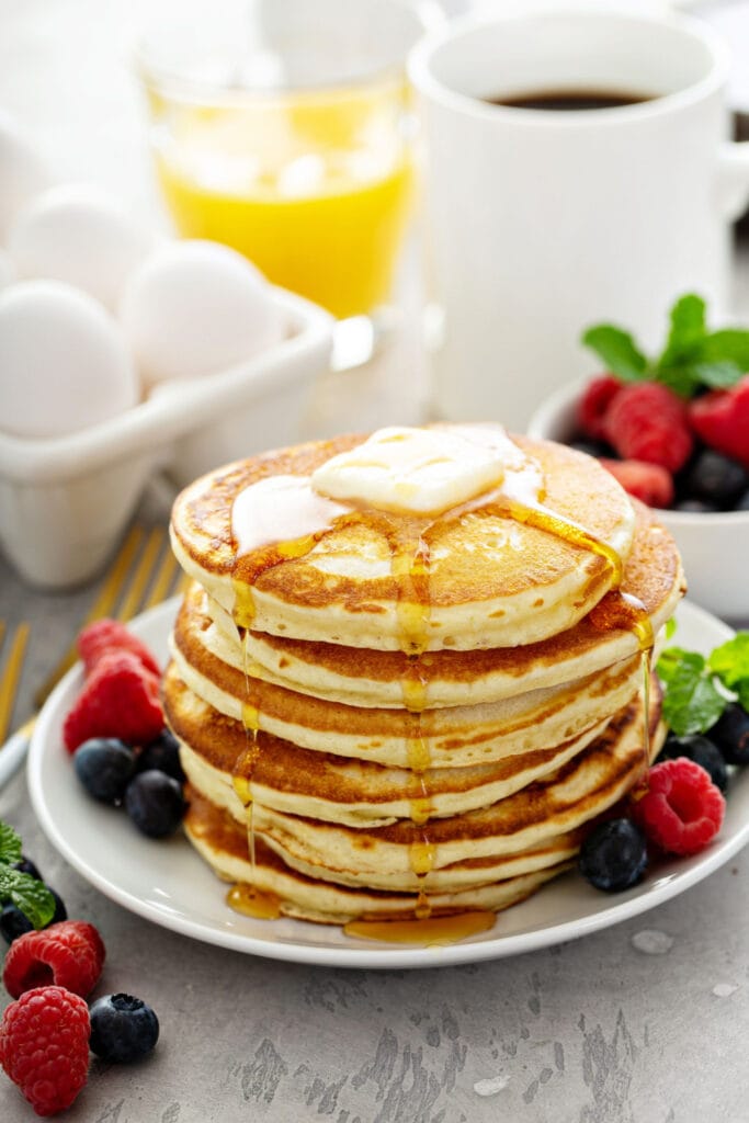 Joy of Cooking Pancake with honey, butter and fruits
