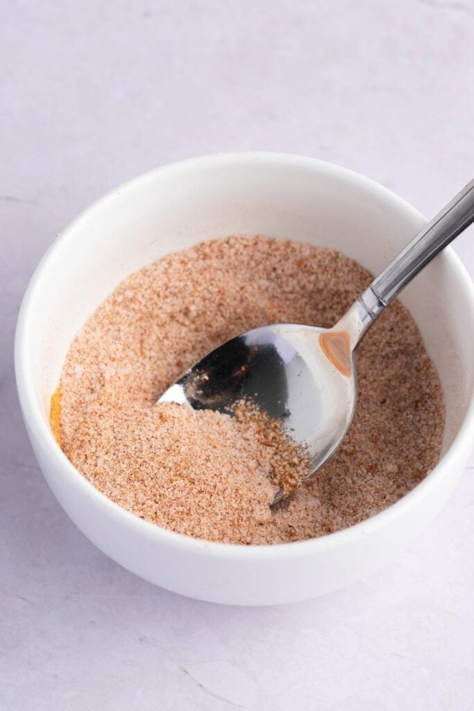 Lawry’s Seasoned Salt Recipe Mixed With  a Spoon on a Bowl