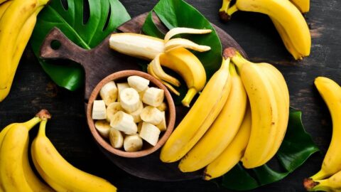 Organic Yellow Banana Slices in a Wooden Background