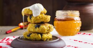 Pumpkin Millet Pancakes with Raisins and Honey
