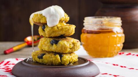 Pumpkin Millet Pancakes with Raisins and Honey