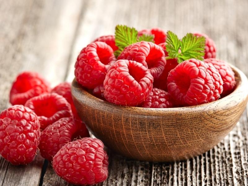 Wooden Bowl With Red Raspberries