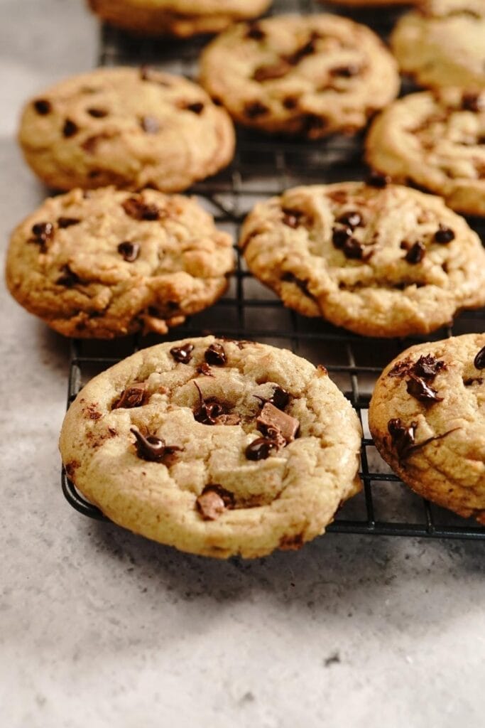 Soft chewy chocolate chip cookies on the baking rack