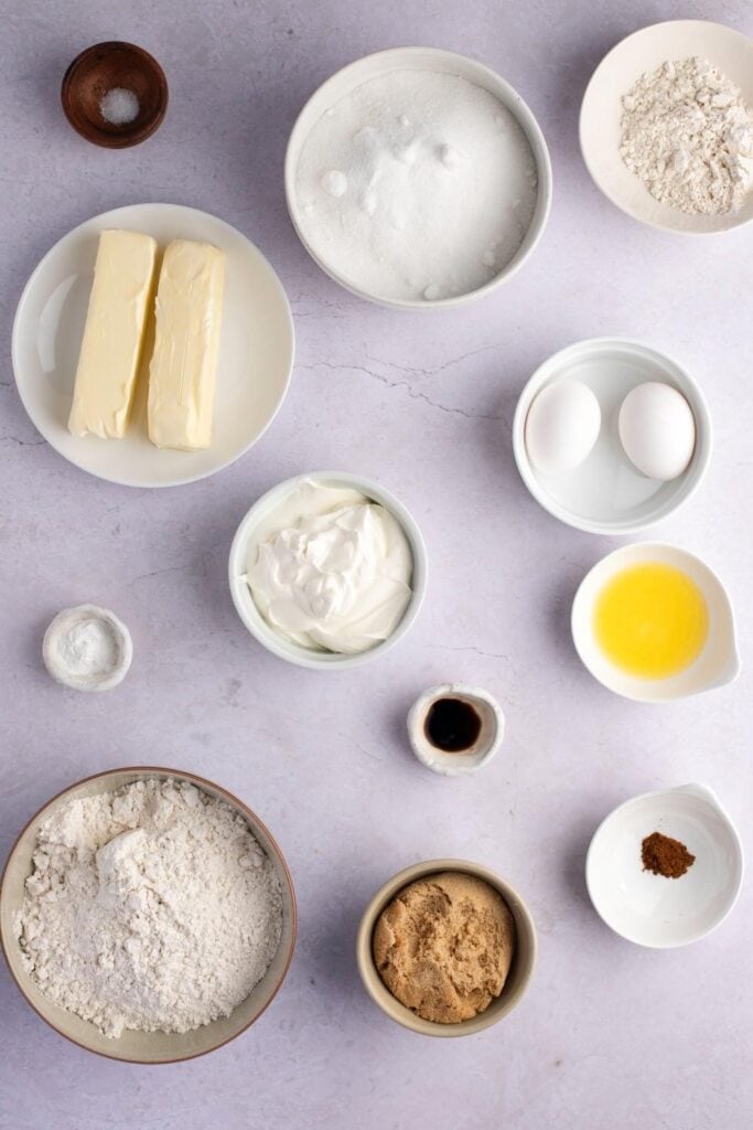 Sour Cream Coffee Cake Ingredients: sugar, flour, butter, salt, eggs, vanilla, sour cream, cinnamon, and brown sugar