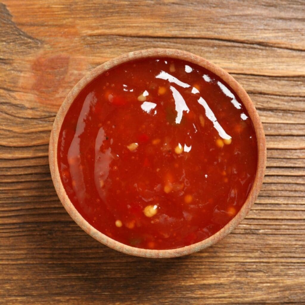 Sweet Chili Sauce on a Small Brown Bowl