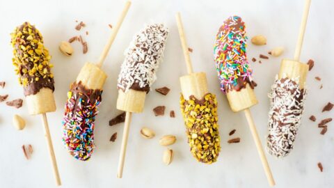 Sweet Chocolate Covered Banana Pops with Candies, Nuts and Coconut