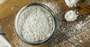Sweet Organic Powdered Sugar in a Sieve